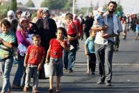 ФРГ готова принять более 15 тысяч сирийских беженцев из Турции