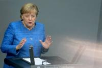 Меркель говорит, что снимать санкции с России еще рано