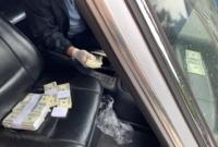 Главу Рокитновской РГА поймали на взятке в 100 тыс. долларов