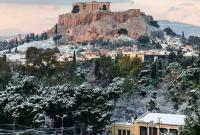 Снегопад парализовал дорожное движение в Афинах